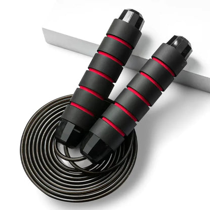 Adjustable steel wire jump rope for fitness training, tangle-free design.